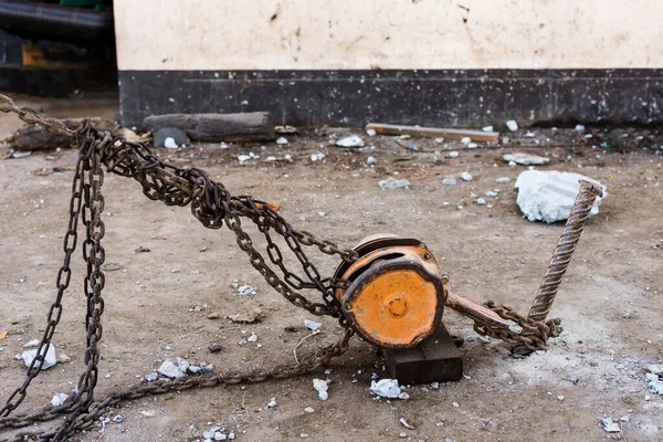 Chain hoist at the construction site or in an industrial plant
