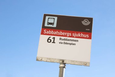 Stockholm, Sweden - August 11, 2022: Close-up view of the SL public transportation bus stop sign at the Sabbatsberg hospital.