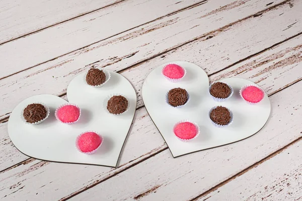 Traditional Brigadeiros Animals Standing Two Heart Shaped Plates Brazilian Sweets — Stock Photo, Image