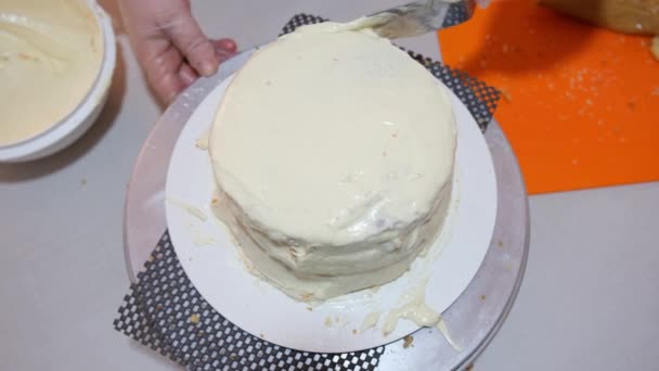 Confectioner Covering Cake White Chocolate Ganache Using Spatula Top View — Stockvideo