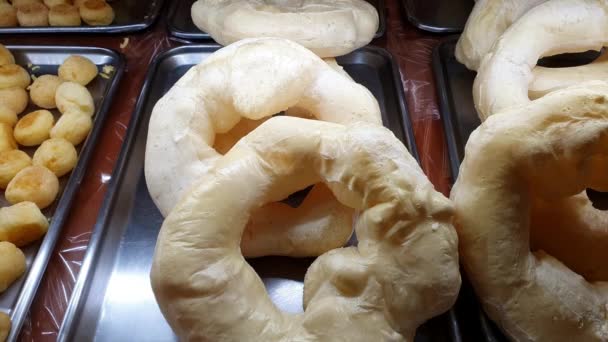 Large Tapioca Flour Donuts Being Displayed Brazilian Bakery Showcase — Vídeos de Stock