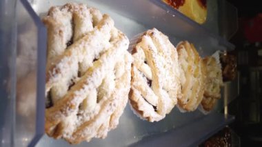 Close Up of Small Crusts with Guava Jelly Filling. A traditional Italian sweet_vertical.