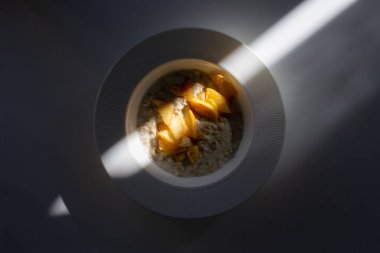 Oatmeal with fruits, delicious breakfast