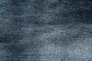 Mavi kot pantolon makro deseni. Kot pantolon arka planı. Soyut batı arkaplanı.