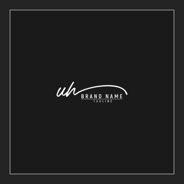 Lüks başlangıçlı UH logosu imzalı el yazısı imzası siyah arkaplanda izole edildi