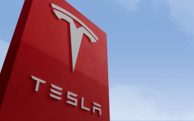 Tesla signage at a dealership in Westmont