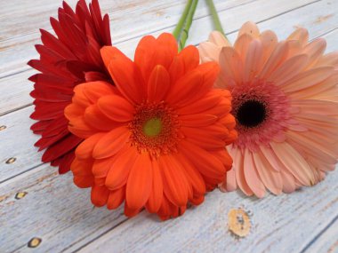 Flowers on a vintage table with space for text