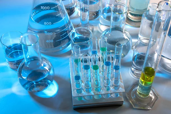 Laboratory Equipment Beaker Flask Cylinders Test Tubes Bluish Light — Photo