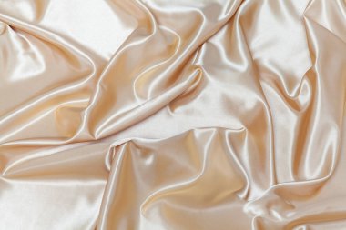 Zarif sarı ipek kumaş arkaplan.