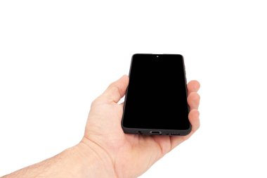 El ele tutuşan cep telefonu ve şablon reklamcılığı ve markalaştırma teknolojisi için boş ekran. İnce çerçeveli ve boş beyaz ekran izole edilmiş gerçekçi akıllı telefon modeli. Herhangi bir kullanıcı arayüzü testi veya sunumu için kullanılabilir.