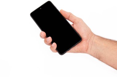 El ele tutuşan cep telefonu ve şablon reklamcılığı ve markalaştırma teknolojisi için boş ekran. İnce çerçeveli ve boş beyaz ekran izole edilmiş gerçekçi akıllı telefon modeli. Herhangi bir kullanıcı arayüzü testi veya sunumu için kullanılabilir.