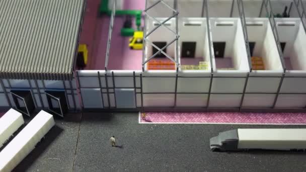 Top view miniatuur mockup van een magazijn met veel kamers. — Stockvideo