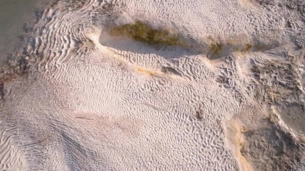 Wavy limestone textured deposits on terraces of minerals. — Wideo stockowe