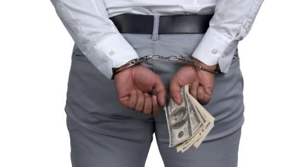 Arrestado esposado con dinero . — Vídeos de Stock