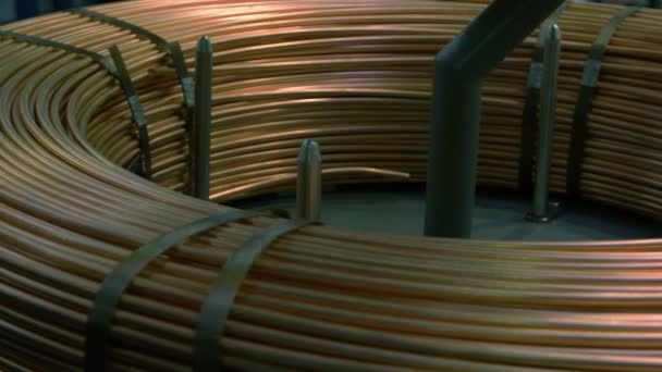Close-up large copper pancake coil of thick wires. — стоковое видео