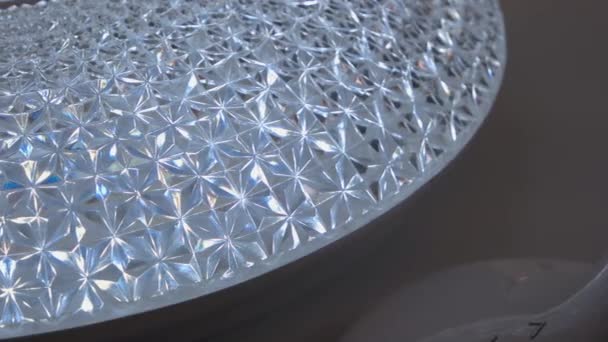Close-up blue patterned glass texture surface. — Vídeos de Stock
