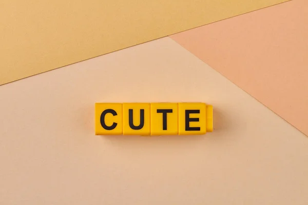 Word Cute Written Yellow Blocks Color Background Attractive Pretty Endearing — Stock Photo, Image