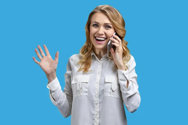 Overjoyed Young Woman Talking Cell Phone Blue Background Happy News — Stock fotografie