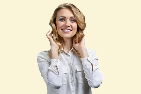 Pretty Smiling Blonde Woman Touching Her Hair Looking Camera Isolated — Stock Photo, Image
