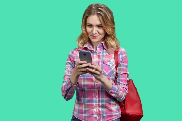Young Smiling Woman Using Smartphone While Standing Color Background People — Stock Photo, Image