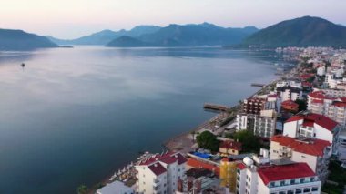 Aerial panoramic view from drone of Marmaris city, Turkey. Beautiful seascape with water and mountains.