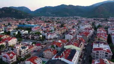 Aerial view of beautiful european town. Green mountains in the background. Marmaris, Turkey.
