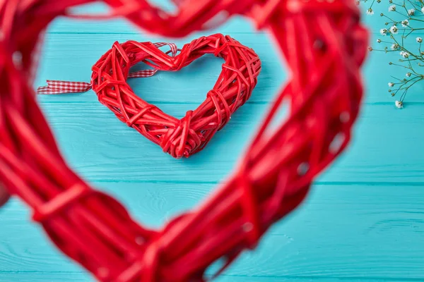 Close Red Wickers Heart Frames Blue Wooden Desk Valentines Day — Stock Photo, Image