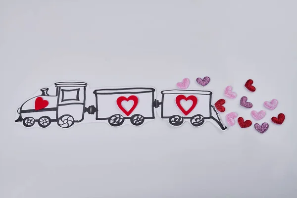 Hand drawn cartoon train with hearts on white background. Abundance of love concept.