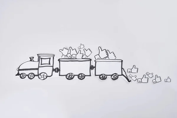 Hand drawn train full of likes on white background. Wagons with piles of thumb up.