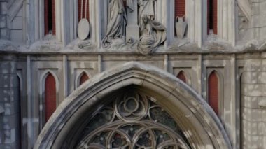 Closeup old ancient Roman Catholic Church with Jesus Christ. Statue of Jesus on the Christ Church.