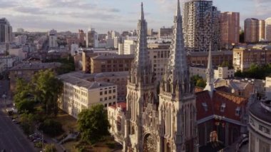 Aerial city scape view with ancient catholic church. Urban architectural landscape.