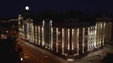 Business center builiding and road at night in Kiev. Astarta business center in Kyiv.