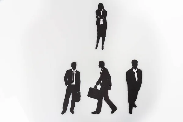Businessman icon set isolated on white. Silhouettes of businessmen and businesswoman.