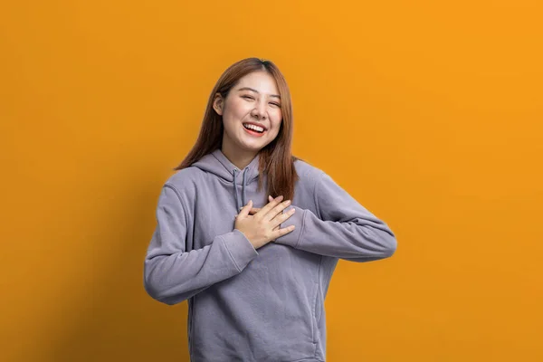 Portrait Beautiful Asian Woman Doing Cheerful Pose Isolated Yellow Background — Stockfoto