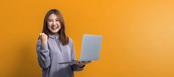 Portrait Beautiful Asian Woman Doing Cheerful Pose Holding Laptop Isolated — Photo