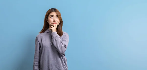 Portrait Beautiful Asian Woman Expressing Thoughtful Doubtful Expressions Isolated Background — стоковое фото