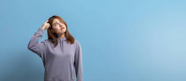 Portrait Beautiful Asian Woman Expressing Thoughtful Doubtful Expressions Isolated Background — стоковое фото