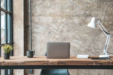 Startup company desks, empty offices, office spaces in marketing staff's offices, desks with office equipment for work, window desks, Meeting rooms in startup companies. Office desk placement ideas.