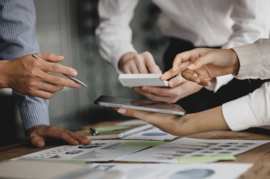 Business man group are meeting together in the office, they are meeting on the topic of finance and financial management, they are business partners. Concept financial management for startup companies