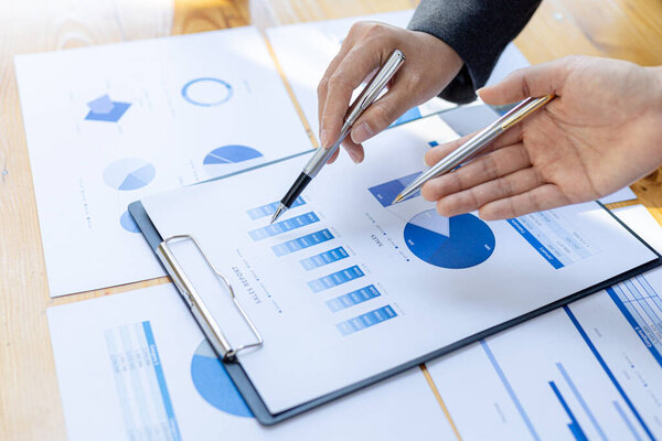 The atmosphere in the startup's meeting room was attended by three delegates to brainstorm and plan the company's operations. Young businessmen form startups and are growing higher. Startup idea.