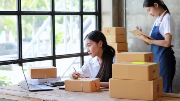 Woman Who Runs Commerce Business Writing List Customers Paper Shipping — Vídeos de Stock