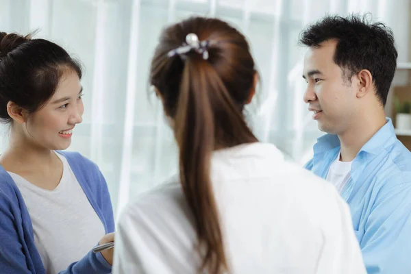 Groups Asian people chatting, business men and women meeting in a conference room, young business man running and running startups, young and energetic group running companies. Startup company concept