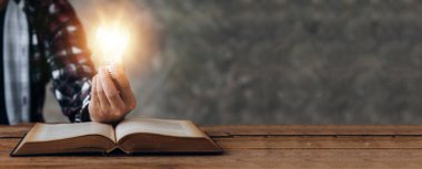 Standing woman holding glowing lamp, Creative new idea. Innovation, brainstorming, strategizing to make the business grow and be profitable. Concept execution, strategy planning and profit management.