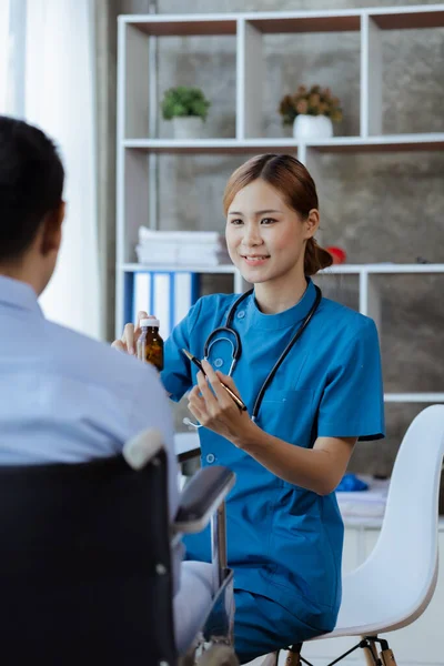Doctors are giving advice on medication to patients in hospital examination rooms, treating diseases from specialists and providing targeted treatment. Concepts of medical treatment and specialists.