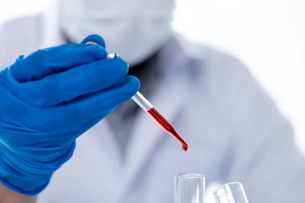 Laboratory assistants are investigating chemical reactions, medical scientists, chemical researchers, chemical experiments and disease testing from patient blood samples. Medicine and research concept