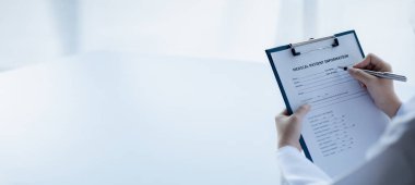 Doctors looking at patient's diagnostic documentation in the hospital's medical room, treating diseases from specialists and providing targeted treatment. Concepts of medical treatment and specialists