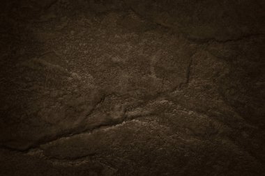 Dekoratif iç ve dış dekoratif için doğal desenli koyu kahverengi taş duvar dokusu.