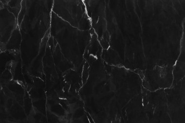 Tasarım sanat çalışmaları ve iç veya dış tasarım için kusursuz desenli yüksek çözünürlüklü siyah mermer dokusu.