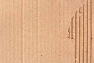 Karton yaprak dokusu arka plan, geri dönüşüm kahverengi yırtık kağıt kutu deseninin ayrıntıları.