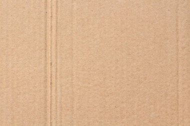 Karton yaprak dokusu arka planı, geri dönüşüm kahverengi karton kutu deseninin ayrıntıları.